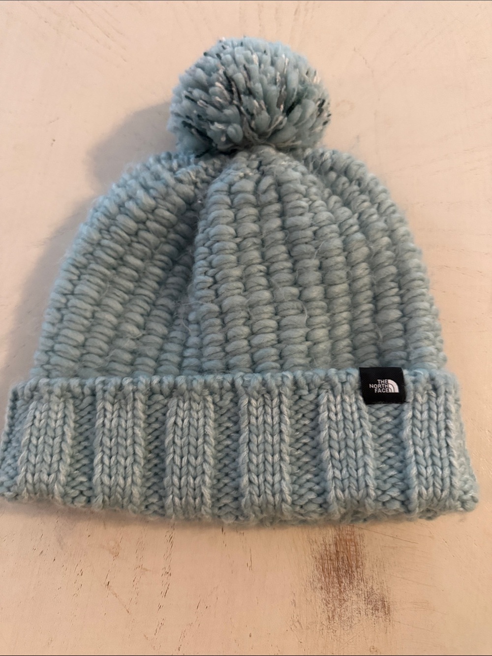 The North Face light blue cozy chunky tassel beanie hat